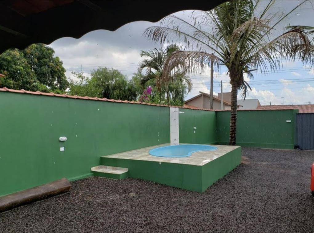 Holiday home Casa Com Pisina Infantil Em *